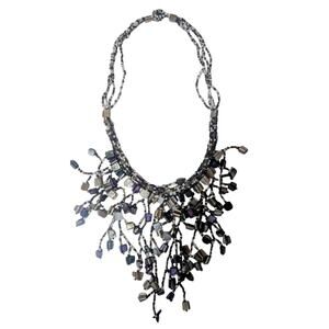 Vintage 18 inch beaded necklace. Beautiful purple, black, white.